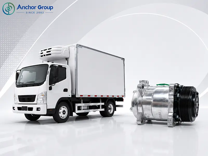 this picture shows an ACTECmax ac compressor beside a refrigerated vehicle